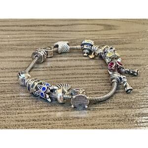 Pandora bracelet authentic pre owned Lots of Charms